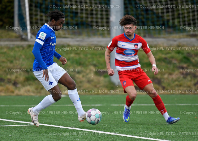 Fußball A-Junioren Bundesliga SV Darmstadt 98 - FC Heidenheim (0:0) 19.02.2022 copyright by Peter Henrich HEN-FOTO | Fußball A-Junioren Bundesliga SV Darmstadt 98 - FC Heidenheim (0:0) 19.02.2022 Nachwuchsleistungszentrum li 7 John Peter Sesay (DA) re 2 Nico Rieger (H) copyright by Peter Henrich HEN-FOTO - Realized with Pictrs.com